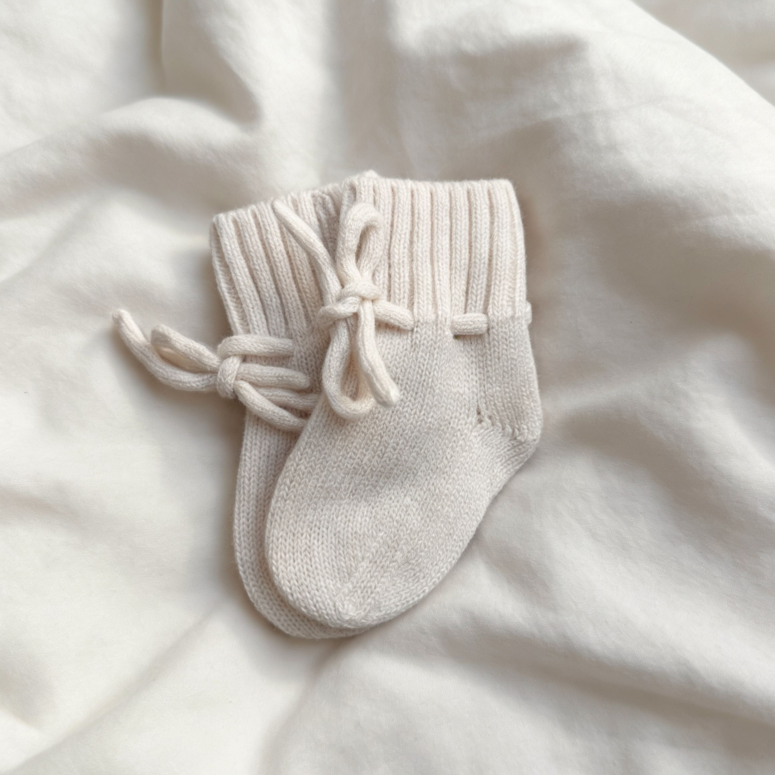 BABYSCHUHE IN CREME